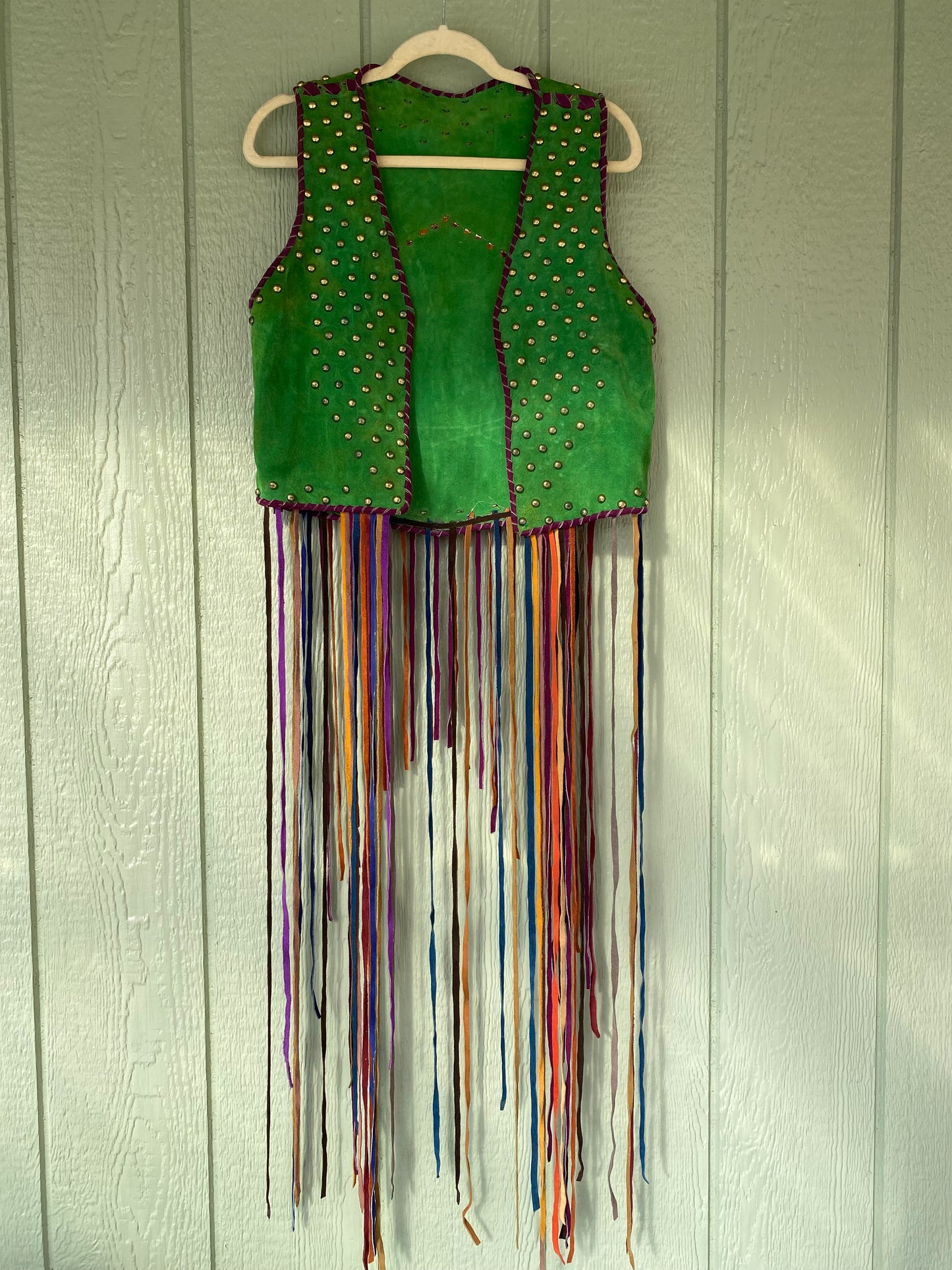 60s Woodstock studded leather vest with tassles